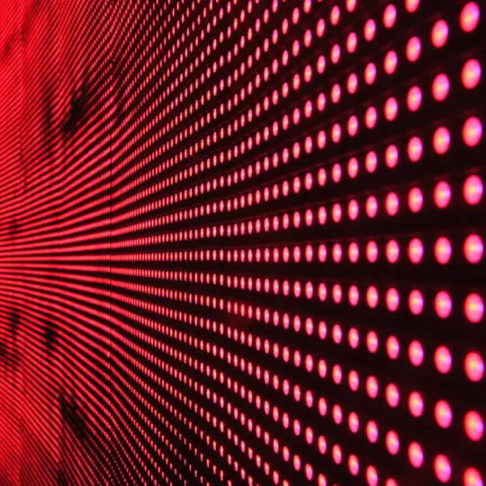 red dot lights on black surface